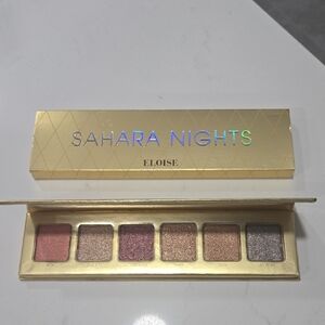 Gold and Purple Eyeshadow Palette with Luxurious Finishes